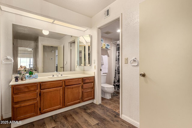 839 S Westwood Unit 287, Mesa, AZ 85210 - bathroom with toilet, wood finished floors, and vanity
