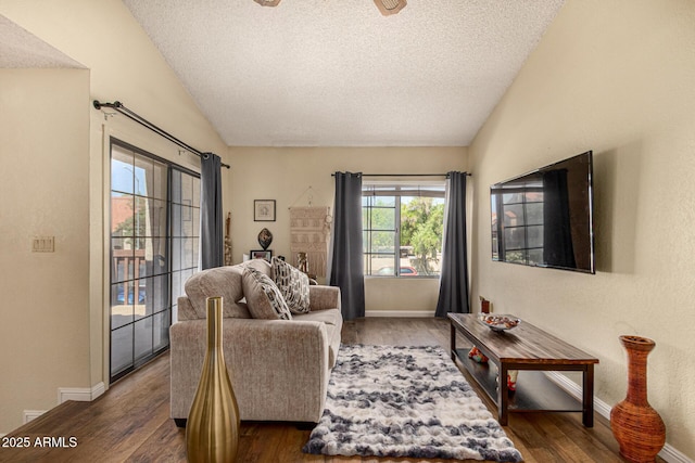 839 S Westwood Unit 287, Mesa, AZ 85210 - living room with vaulted ceiling, a textured ceiling, wood finished floors, baseboards, and ceiling fan