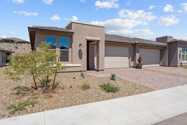 view of front of property with a garage