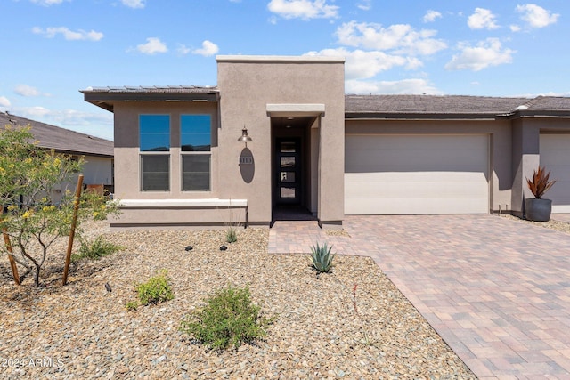 view of front of property featuring a garage