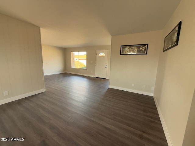 interior space with dark hardwood / wood-style floors