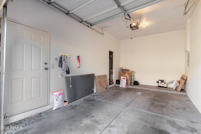 garage featuring a garage door opener