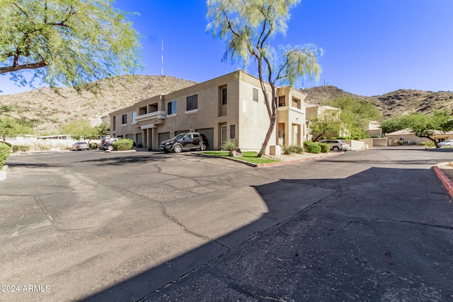 exterior space featuring a mountain view