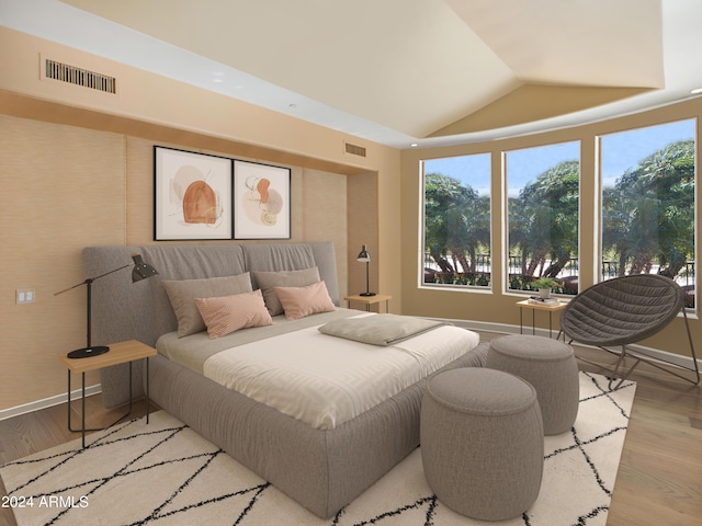 bedroom featuring vaulted ceiling, baseboards, visible vents, and light wood-style floors