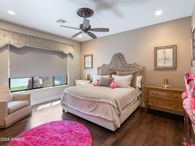 bedroom featuring ceiling fan and dark hardwood / wood-style flooring