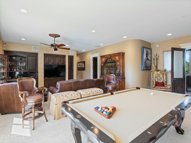 recreation room with light carpet, visible vents, and recessed lighting