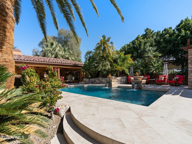 pool featuring a patio