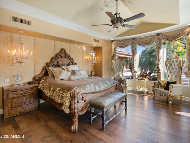 bedroom with visible vents, vaulted ceiling, and dark wood-style flooring