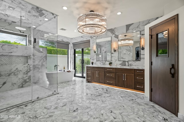 5740 N Casa Blanca Dr, Paradise Valley, AZ 85253 - full bathroom featuring a chandelier, double vanity, recessed lighting, a marble finish shower, and marble finish floor