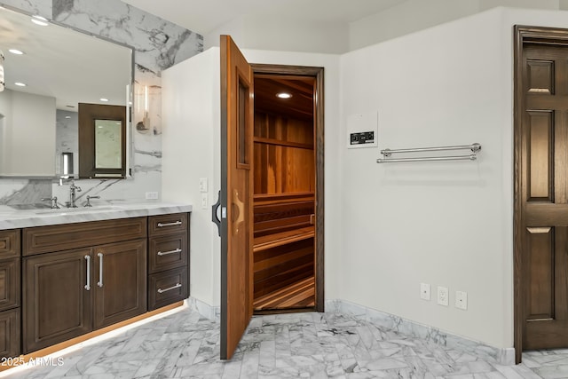 5740 N Casa Blanca Dr, Paradise Valley, AZ 85253 - bathroom featuring marble finish floor, vanity, and recessed lighting