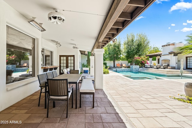 5740 N Casa Blanca Dr, Paradise Valley, AZ 85253 - view of patio / terrace featuring a fenced in pool, outdoor dining area, and a hot tub