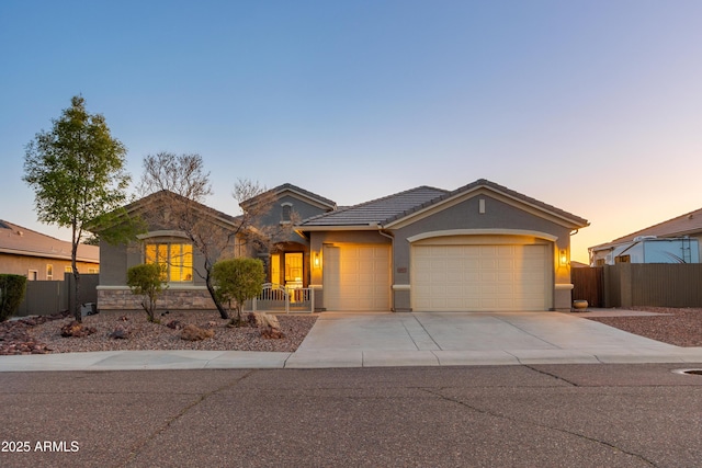 view of front of property featuring a garage