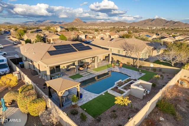 drone / aerial view featuring a mountain view