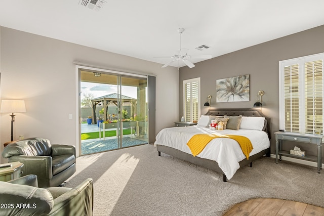 bedroom featuring ceiling fan and access to outside