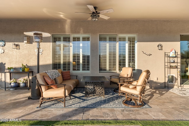 view of patio featuring an outdoor hangout area and ceiling fan