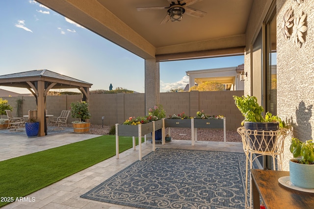 view of patio with ceiling fan