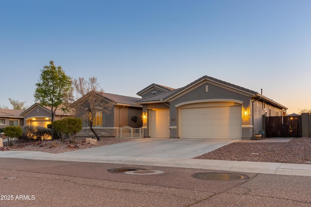 ranch-style home featuring a garage