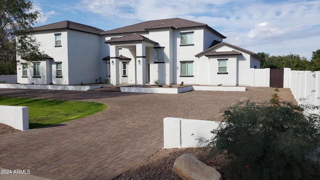 2060 E Quartz St, Mesa, AZ 85213 - view of front of house featuring stucco siding and curved driveway