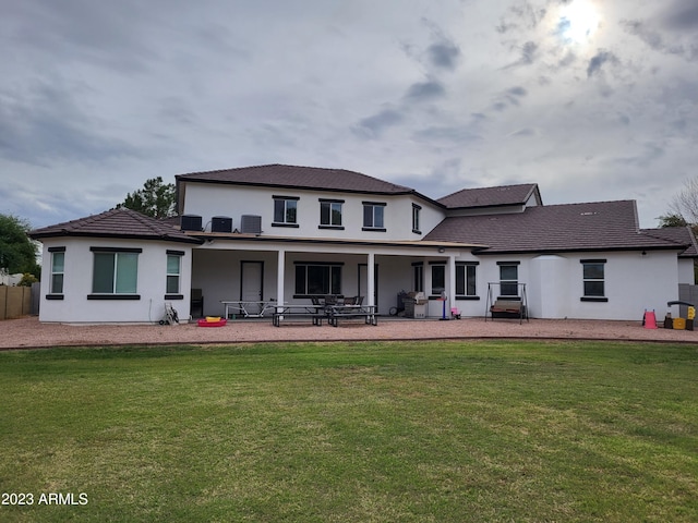 2060 E Quartz St, Mesa, AZ 85213 - rear view of property with a patio, stucco siding, and a lawn