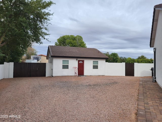 2060 E Quartz St, Mesa, AZ 85213 - view of front of property featuring a gate, stucco siding, and a tiled roof