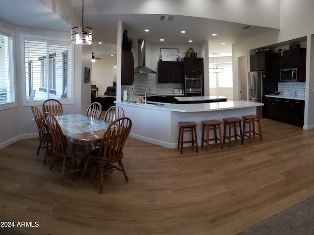 2060 E Quartz St, Mesa, AZ 85213 - dining room with light wood-style floors, healthy amount of natural light, a chandelier, and recessed lighting
