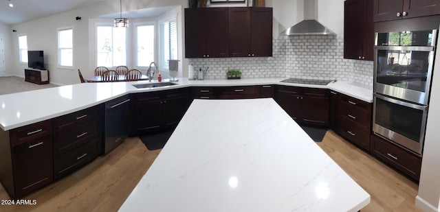 2060 E Quartz St, Mesa, AZ 85213 - kitchen with a sink, wall chimney range hood, stainless steel double oven, black electric cooktop, and a peninsula