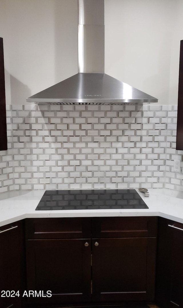 2060 E Quartz St, Mesa, AZ 85213 - kitchen with wall chimney exhaust hood, tasteful backsplash, and black electric cooktop