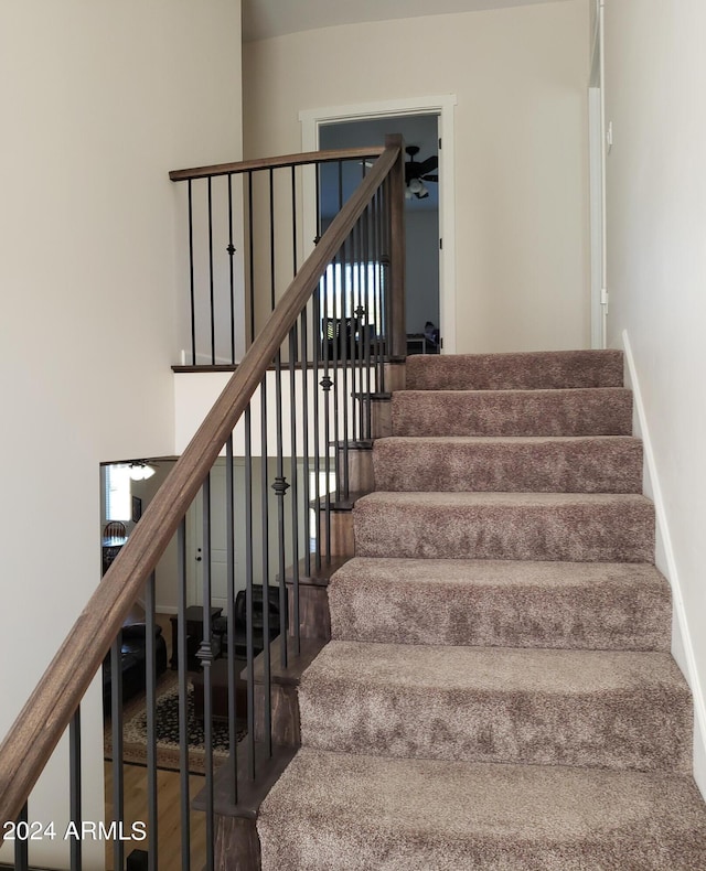 2060 E Quartz St, Mesa, AZ 85213 - stairs with wood finished floors and baseboards