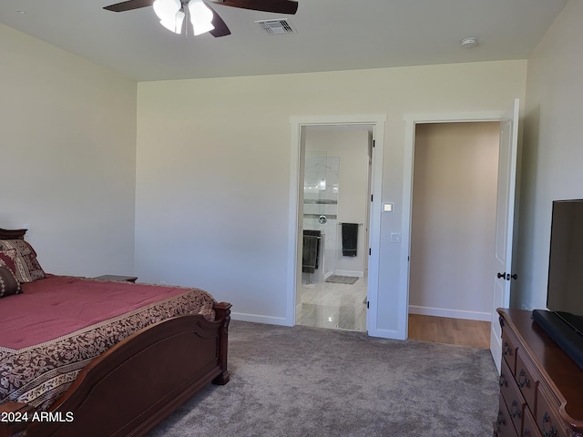 2060 E Quartz St, Mesa, AZ 85213 - carpeted bedroom with baseboards, ensuite bath, and ceiling fan
