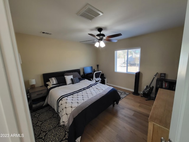 2060 E Quartz St, Mesa, AZ 85213 - bedroom featuring wood finished floors, baseboards, and ceiling fan