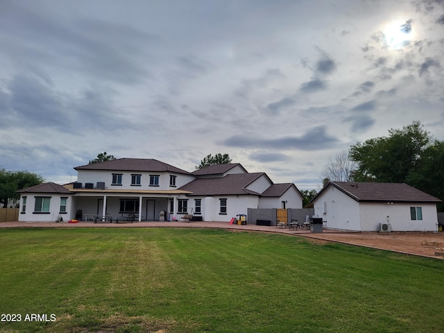 2060 E Quartz St, Mesa, AZ 85213 - rear view of property with a patio, a lawn, and stucco siding