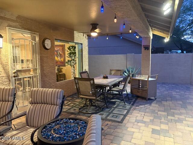 view of patio / terrace with outdoor dining space and fence