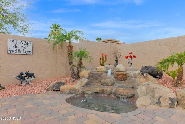 view of patio featuring a fenced backyard