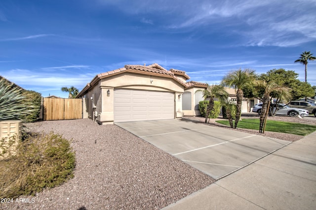 view of front of home with a garage