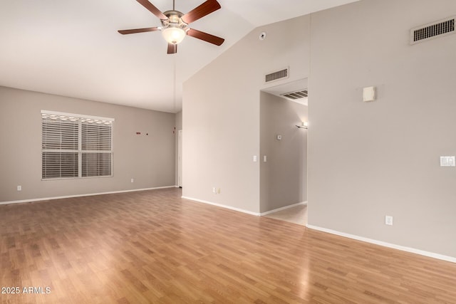 unfurnished room with high vaulted ceiling, ceiling fan, and light wood-type flooring