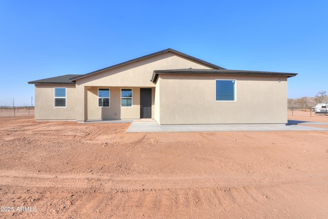 view of front of home featuring stucco siding