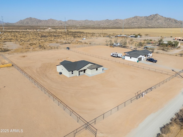 bird's eye view with a desert view, a rural view, and a mountain view