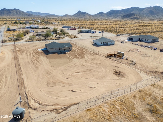 drone / aerial view with a rural view, a desert view, and a mountain view