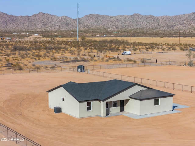 birds eye view of property featuring a rural view and a mountain view