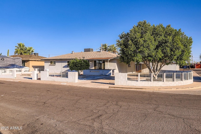 5827 N 22nd Dr, Phoenix, AZ 85015 - view of front of house featuring a fenced front yard and stucco siding
