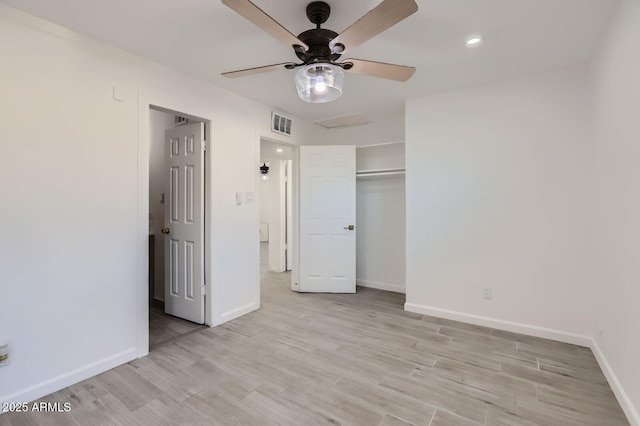 5827 N 22nd Dr, Phoenix, AZ 85015 - unfurnished bedroom with light wood-type flooring, a closet, a ceiling fan, and recessed lighting