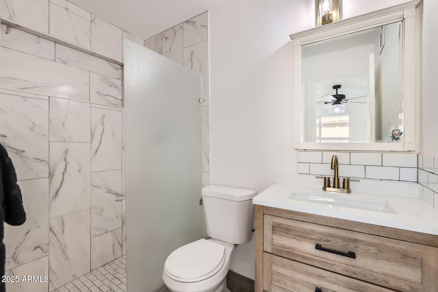5827 N 22nd Dr, Phoenix, AZ 85015 - full bathroom featuring tiled shower, vanity, and a ceiling fan