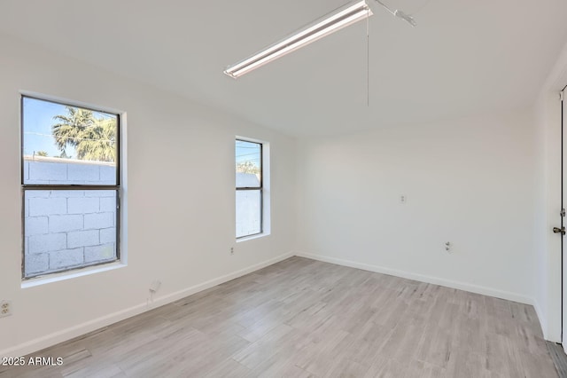 5827 N 22nd Dr, Phoenix, AZ 85015 - spare room featuring light wood-type flooring