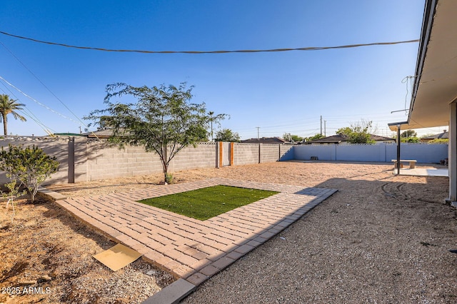 5827 N 22nd Dr, Phoenix, AZ 85015 - fenced backyard featuring a patio area
