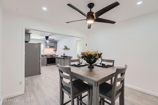 5827 N 22nd Dr, Phoenix, AZ 85015 - dining area with ceiling fan, recessed lighting, and light wood-style floors