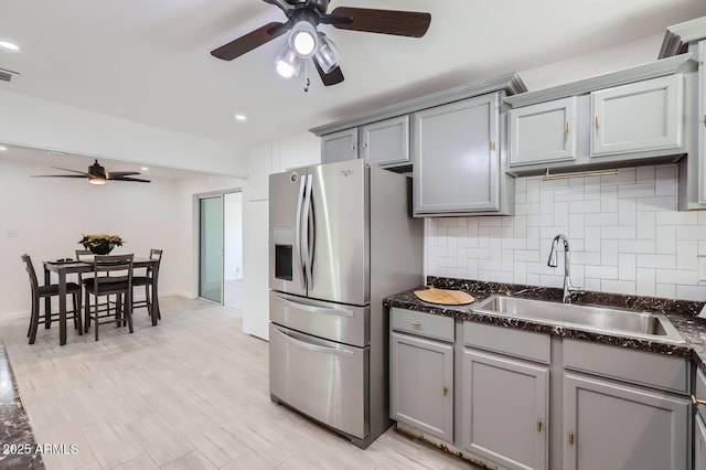 5827 N 22nd Dr, Phoenix, AZ 85015 - kitchen with stainless steel fridge, gray cabinets, and ceiling fan