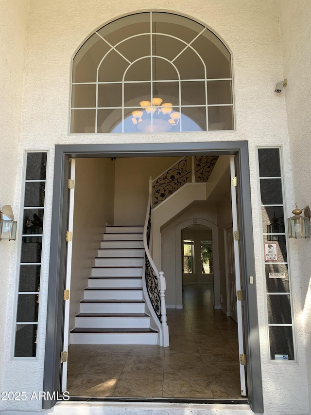 property entrance featuring stucco siding