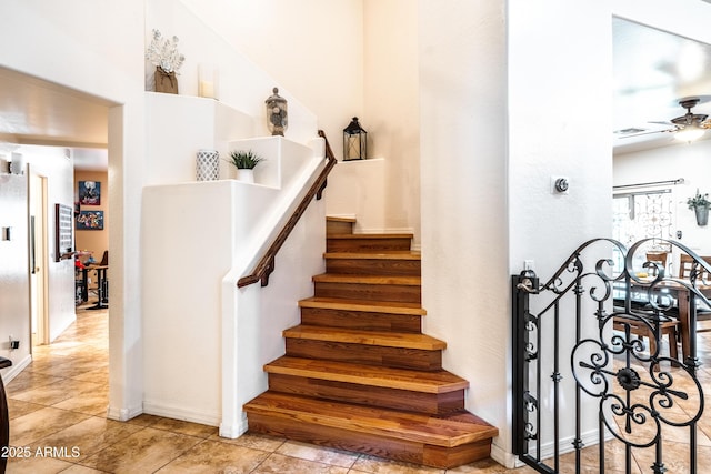 3511 W Allens Peak Dr, San Tan Valley, AZ 85144 - stairway featuring ceiling fan and tile patterned flooring