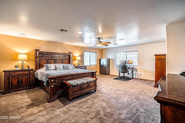 3511 W Allens Peak Dr, San Tan Valley, AZ 85144 - carpeted bedroom with a desk and ceiling fan