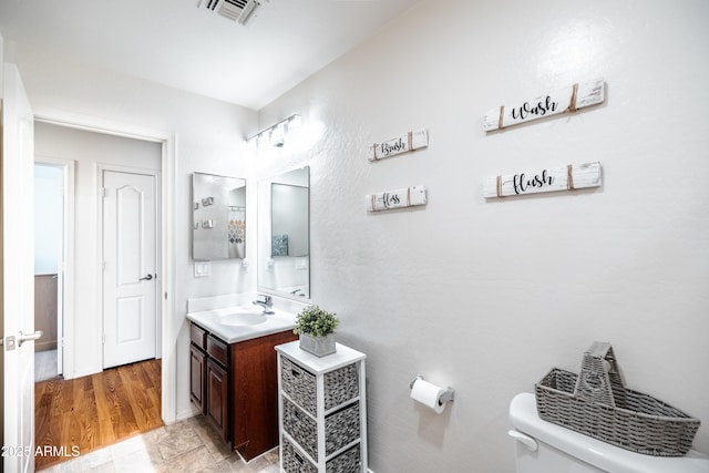 3511 W Allens Peak Dr, San Tan Valley, AZ 85144 - bathroom featuring vanity and toilet